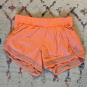 Athleta Mesh Racer Run Short 4” Orange with Zip Pocket EUC